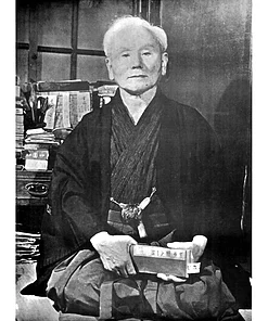Plakat af mester Gichin Funakoshi